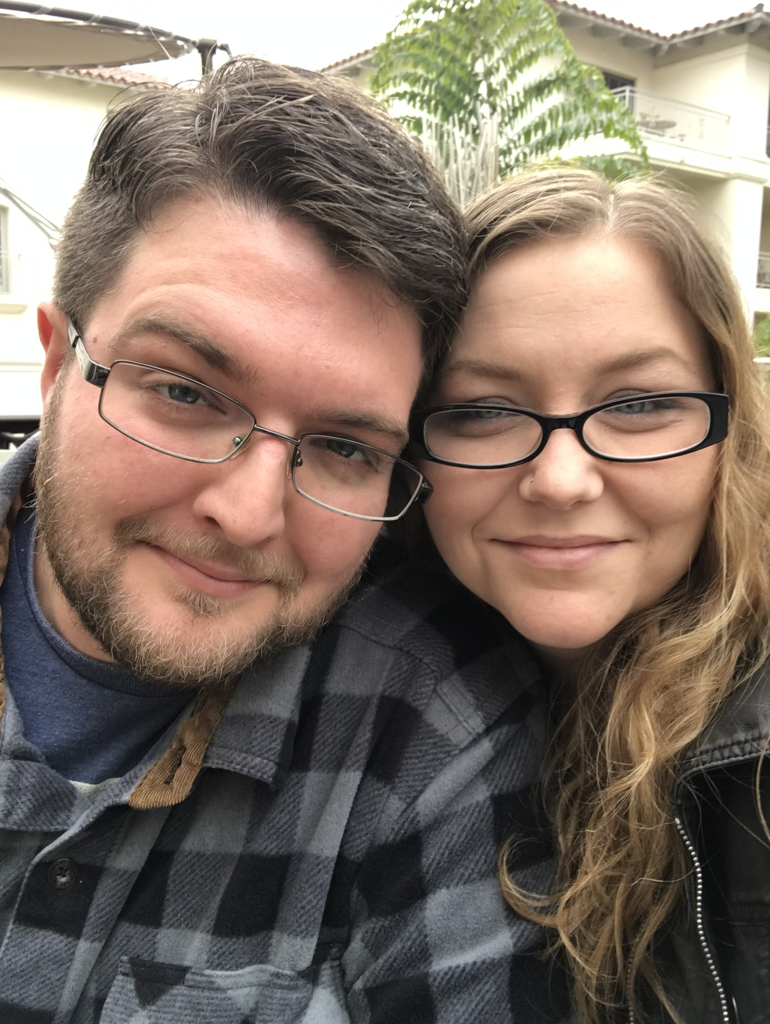 Charles and Sarah smiling together outdoors
